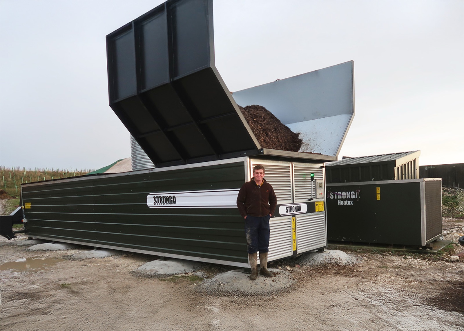 Drying Poultry Manure with FlowDrya - stainless steel manure dryer with farmer