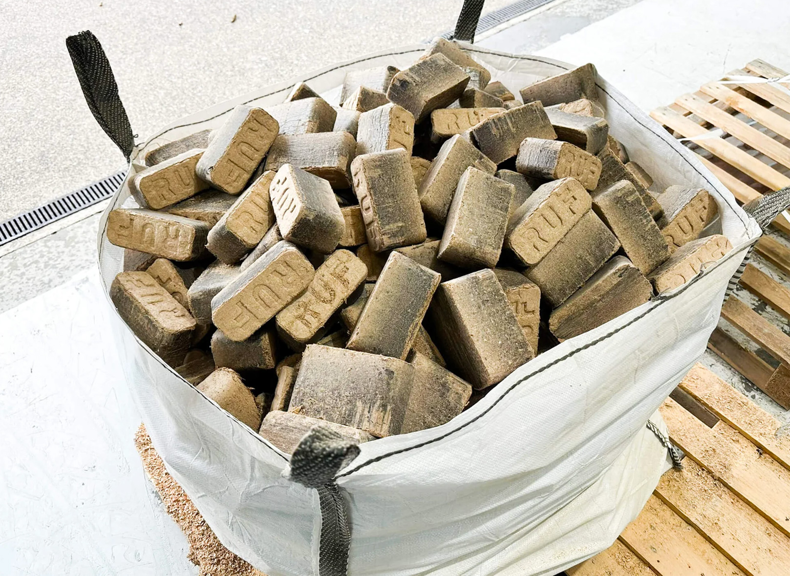 Wood briquettes produced from dried waste wood